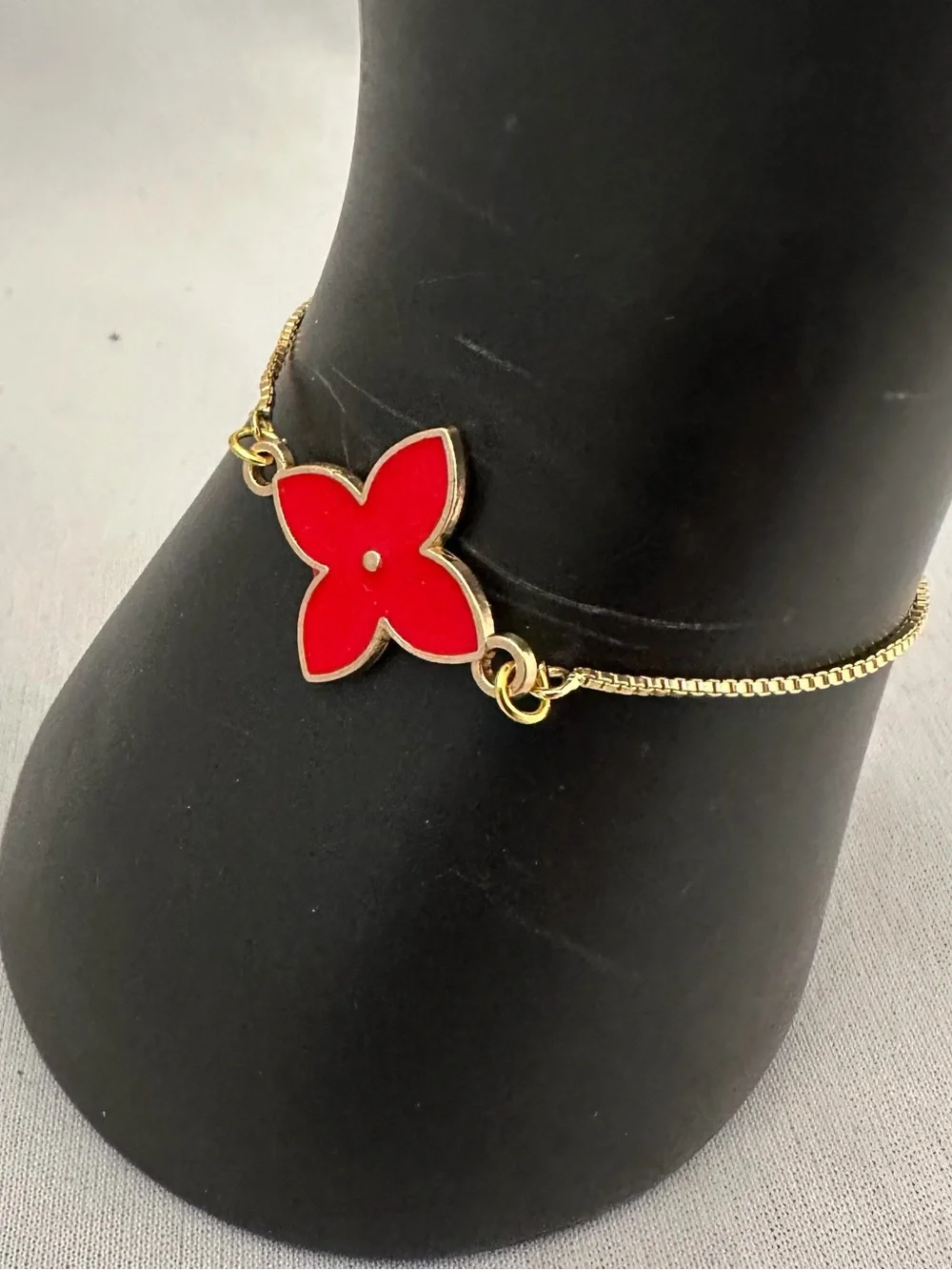 Handcrafted Gold-Tone Bracelet with red enameled flower